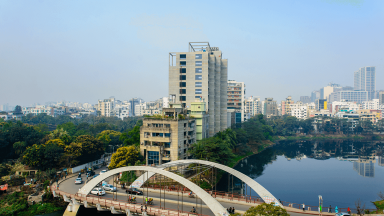 A scenic bridge over a lake in Dhaka city, Bangladesh. Explore the advantages of teaming up with a digital marketing agency in Bangladesh.